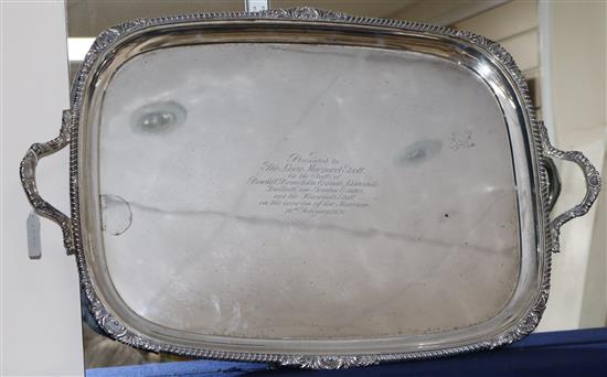 A George V silver rectangular two handled tea tray, with shell and gadrooned border, Thomas Bradbury & Sons, London, 1925,